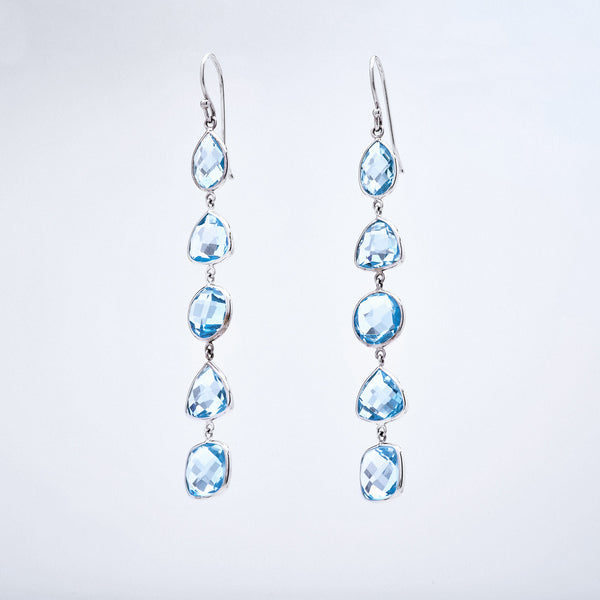 White Gold and Blue Topaz 5 Stone Drop Earrings
