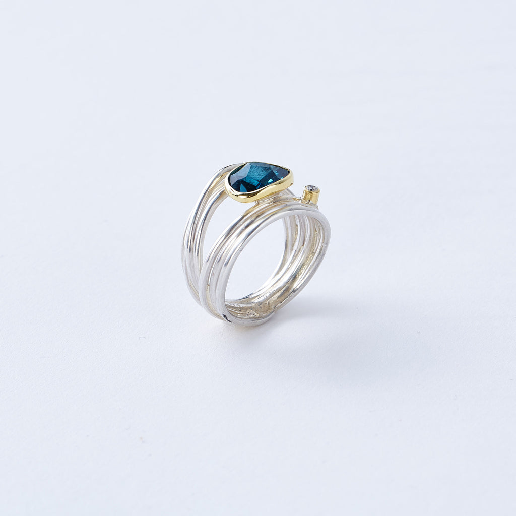 Blue Topaz and Diamond Ring